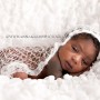 Beautiful baby girl with full head of hair, African-American newborn baby,