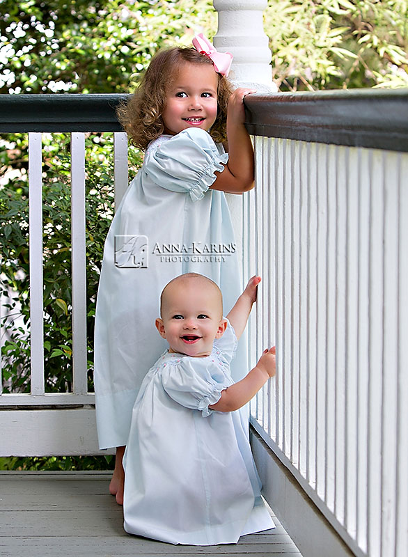 Sisters on porch, southern style portrait, smocked dress