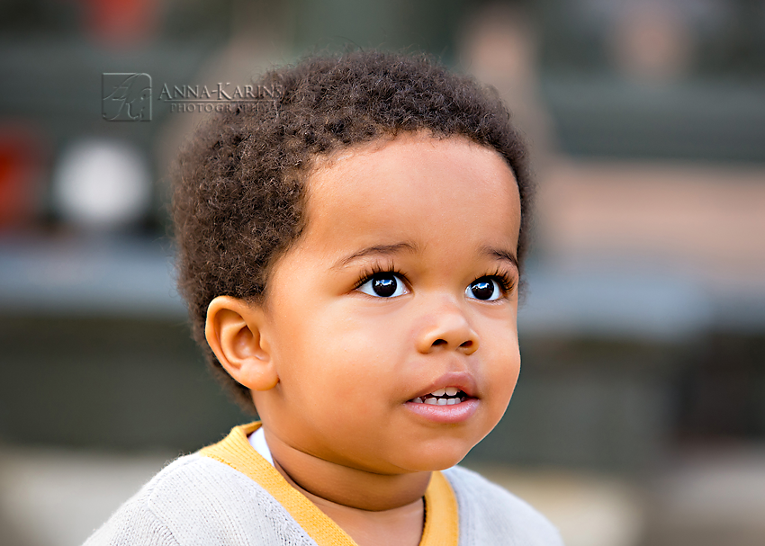 Handsome toddler boy with long eye lashes, big brown eyes on toddler boy, African American little boy 