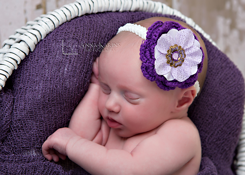 babygirl in purple head band