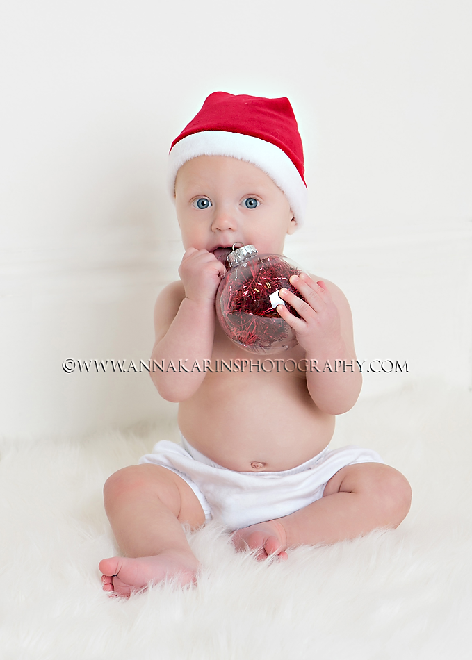 little baby boy in santa hat